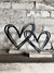 Set of 2 Wire Brushed Metal Heart Stands On Wooden