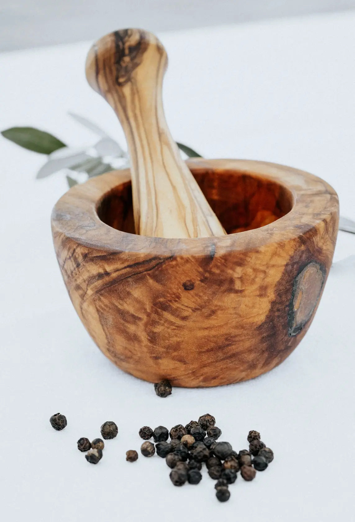 Wooden Mortar with Pestle On Wooden